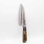 Rucker Knife Mid Chef's Knife in a vertical orientation.