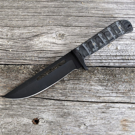 The Mitchell – “Honor Carved in Steel”