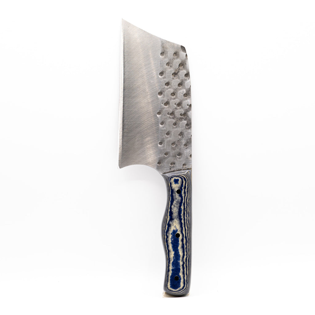 Rucker Knives Sawtooth Cleaver with a blue canyon maple handle, on white background vertical orientation